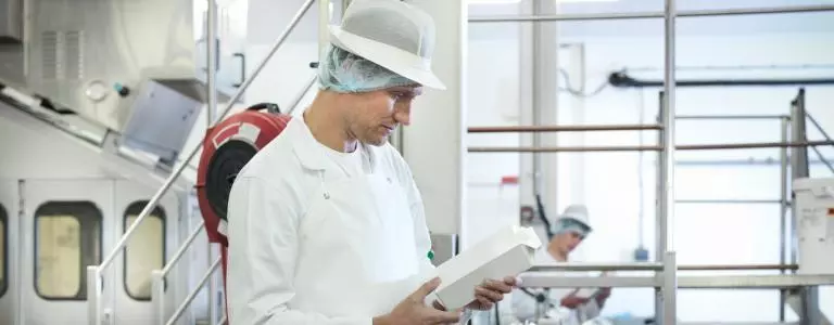 Man in food and beverage manufacturing facility